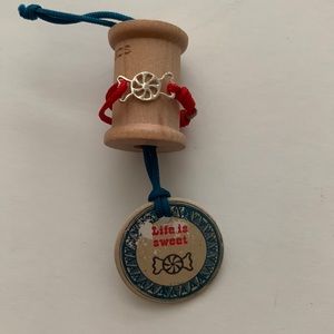 Silver plated, adjustable, string ring with candy. Life is sweet.